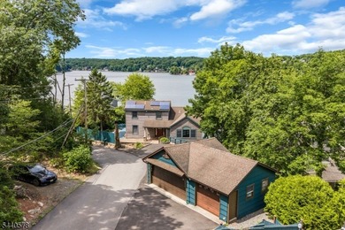 Custom lakefront chalet offering deep-water frontage, an - photo 2