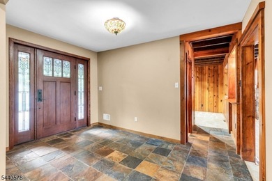 Custom lakefront chalet offering deep-water frontage, an - photo 6