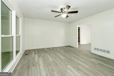 Fully remodeled and move-in ready, this impressive 5-bedroom, 3 - photo 13