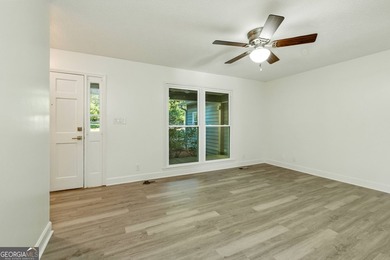 Fully remodeled and move-in ready, this impressive 5-bedroom, 3 - photo 14