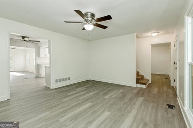 Fully remodeled and move-in ready, this impressive 5-bedroom, 3 - photo 15