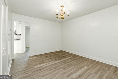 Fully remodeled and move-in ready, this impressive 5-bedroom, 3 - photo 16