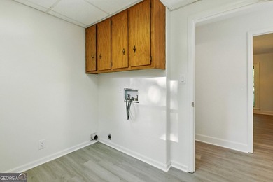 Fully remodeled and move-in ready, this impressive 5-bedroom, 3 - photo 19