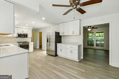 Fully remodeled and move-in ready, this impressive 5-bedroom, 3 - photo 21