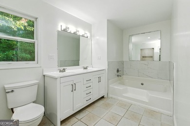 Fully remodeled and move-in ready, this impressive 5-bedroom, 3 - photo 26