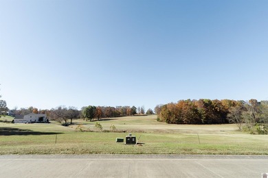 With the backyard facing Benton Golf & Country Club's hole 17