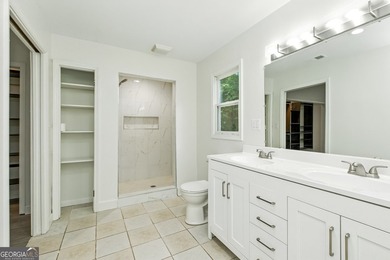 Fully remodeled and move-in ready, this impressive 5-bedroom, 3 - photo 27