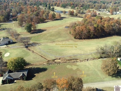 With the backyard facing Benton Golf & Country Club's hole 17