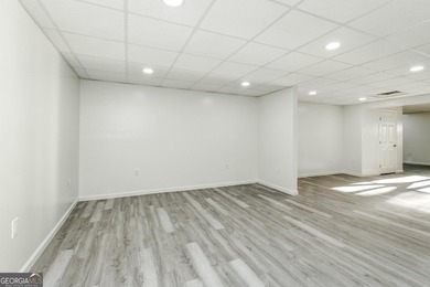 Fully remodeled and move-in ready, this impressive 5-bedroom, 3 - photo 48