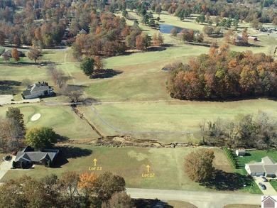 With the backyard facing Benton Golf & Country Club's hole 17