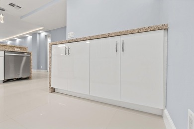Every inch of this residence gleams from its meticulous top to - photo 7