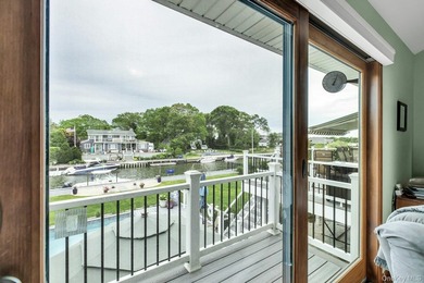 WATERFRONT LIVING AT ITS FINEST Nestled within a private - photo 21