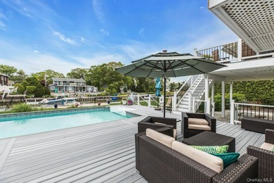 WATERFRONT LIVING AT ITS FINEST Nestled within a private - photo 27