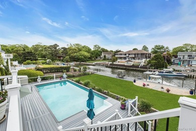 WATERFRONT LIVING AT ITS FINEST Nestled within a private - photo 29