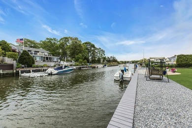 WATERFRONT LIVING AT ITS FINEST Nestled within a private - photo 33
