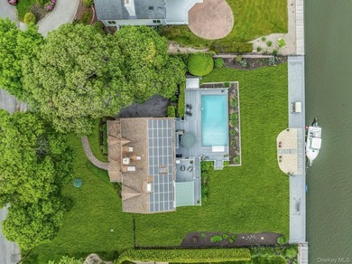 WATERFRONT LIVING AT ITS FINEST Nestled within a private - photo 36