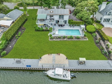 WATERFRONT LIVING AT ITS FINEST Nestled within a private - photo 37