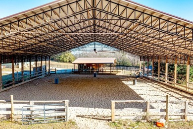 Established 27.38-acre equestrian ranch with boarding income - photo 1
