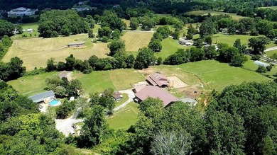 Established 27.38-acre equestrian ranch with boarding income - photo 4