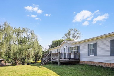 Established 27.38-acre equestrian ranch with boarding income - photo 6