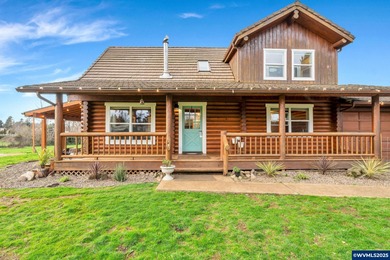 Welcome to this beautifully updated log-style home on 1.5 acres