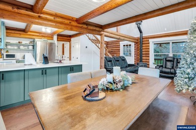 Welcome to this beautifully updated log-style home on 1.5 acres