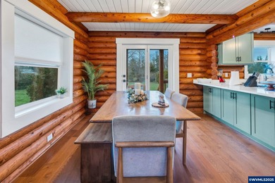 Welcome to this beautifully updated log-style home on 1.5 acres