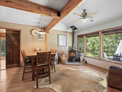 Nestled on a private, wooded .5-acre lot, this chalet-style home - photo 12