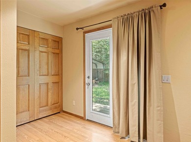Nestled on a private, wooded .5-acre lot, this chalet-style home - photo 20