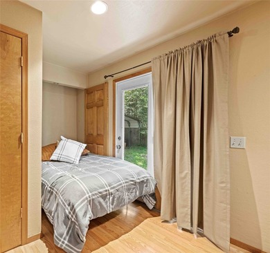 Nestled on a private, wooded .5-acre lot, this chalet-style home - photo 21