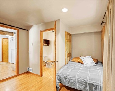 Nestled on a private, wooded .5-acre lot, this chalet-style home - photo 22