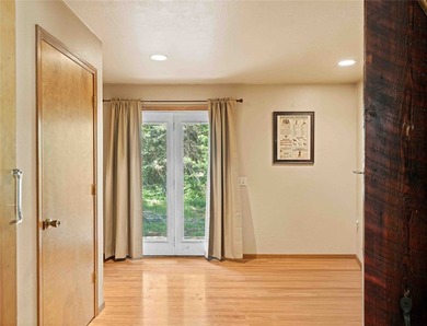Nestled on a private, wooded .5-acre lot, this chalet-style home - photo 25