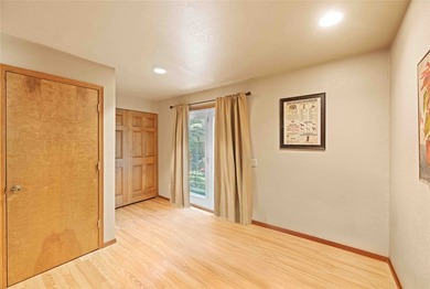 Nestled on a private, wooded .5-acre lot, this chalet-style home - photo 26