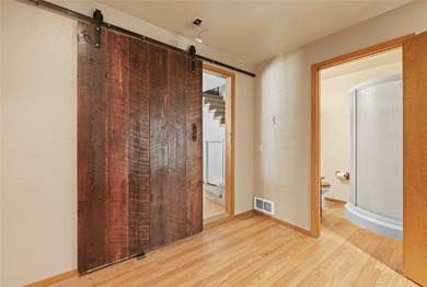 Nestled on a private, wooded .5-acre lot, this chalet-style home - photo 29