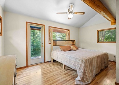 Nestled on a private, wooded .5-acre lot, this chalet-style home - photo 31
