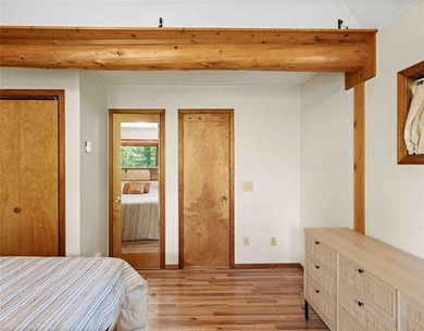 Nestled on a private, wooded .5-acre lot, this chalet-style home - photo 33