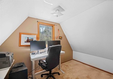 Nestled on a private, wooded .5-acre lot, this chalet-style home - photo 38