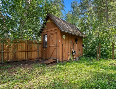 Nestled on a private, wooded .5-acre lot, this chalet-style home - photo 43