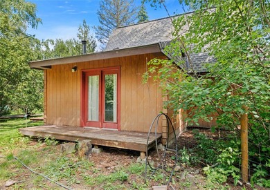 Nestled on a private, wooded .5-acre lot, this chalet-style home - photo 47