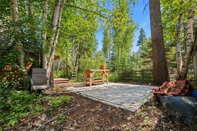 Nestled on a private, wooded .5-acre lot, this chalet-style home - photo 50