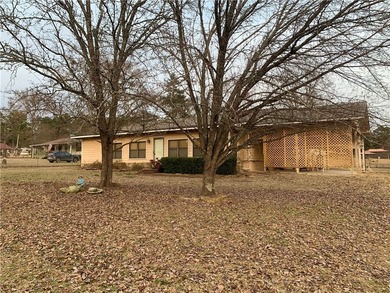 Charming 3-bedroom, 2-bath home situated on a full 1-acre fully - photo 4