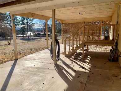 Charming 3-bedroom, 2-bath home situated on a full 1-acre fully - photo 9