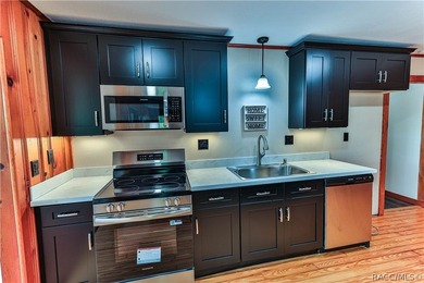 This canal-front home is move in ready and full of character and - photo 11