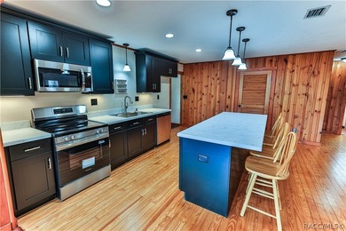This canal-front home is move in ready and full of character and - photo 12