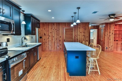 This canal-front home is move in ready and full of character and - photo 14