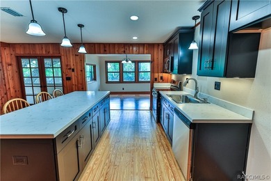 This canal-front home is move in ready and full of character and - photo 15