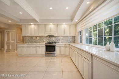This builder's own home sits proudly atop a hill overlooking - photo 16
