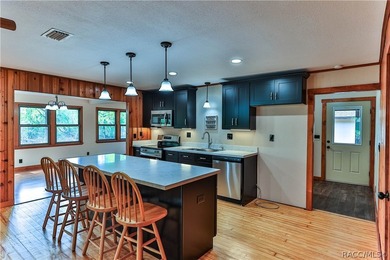 This canal-front home is move in ready and full of character and - photo 17