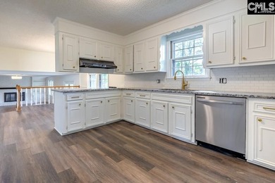 Beautifully updated 4br/3.5ba tri-level home in Coldstream with - photo 10