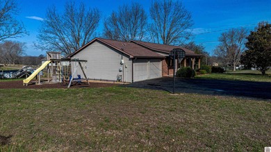 Welcome to 91 Thorn Drive, where country living meets lake - photo 2